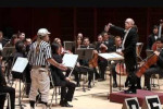 orchestra with referee