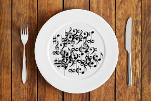 music notes and symbols on a plate